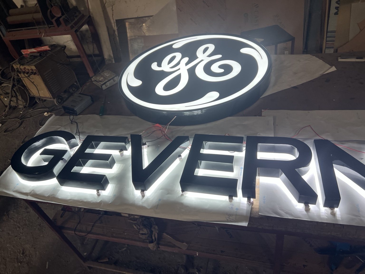 GE Vernova illuminated identity fabrication